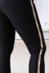 Czarne eleganckie spodnie dresowe ze złotym lampasem z napisem fashion - Aurora