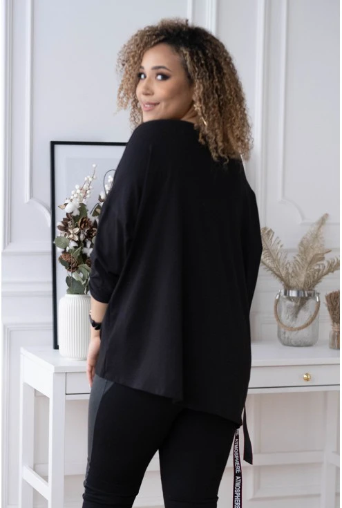 czarna bluzka oversize z modnym wiązaniem