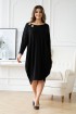 Czarna sukienka z ozdobnymi kółkami - Vogue