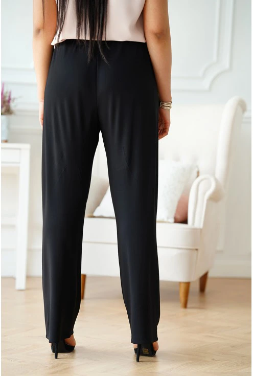 Czarne materiałowe spodnie plus size z szeroką nogawką z gumką w pasie
