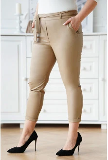 Beżowe spodnie z eco skóry z kieszeniami i paskiem - Valentie