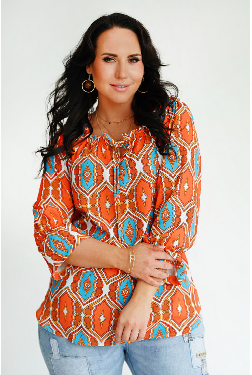 Pomarańczowo-kremowa bluzka z wzorem