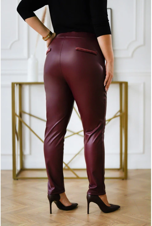 Bordowe ocieplane spodnie z eco skóry z imitacją kieszeni plus size