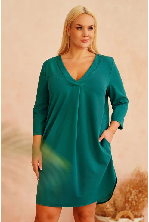 Butelkowa sukienka z dekoltem V z ozdobną broszką plus size xl-ka.pl