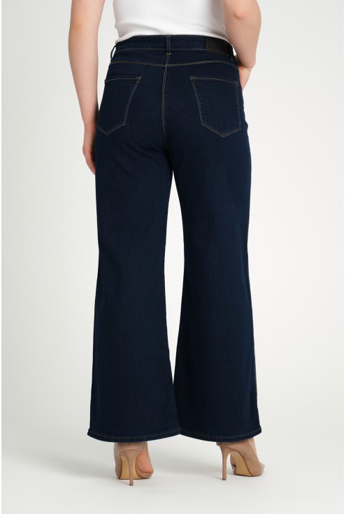 wygodne jeansy z szeroka nogawka w duzych rozmiarach marinea od monasou